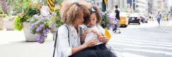 woman holding small child