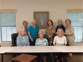 group of women posing for picture