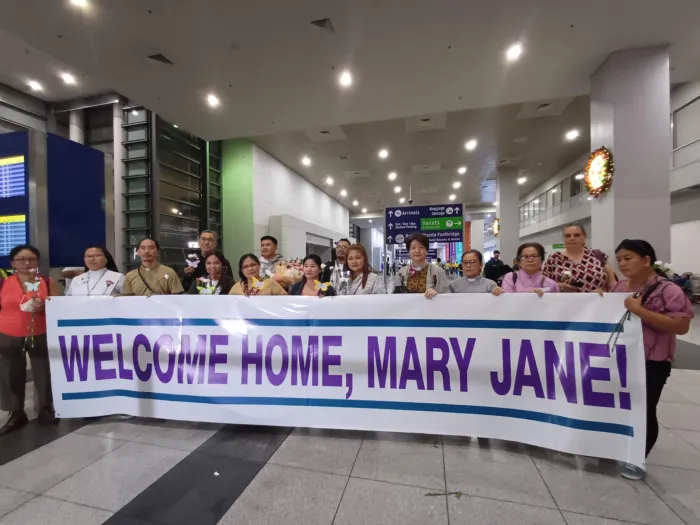 Supporters of domestic worker Mary Jane Veloso, imprisoned unjustly in Indonesia for 14 years, await her arrival at the Manila airport. (Contributed photo)