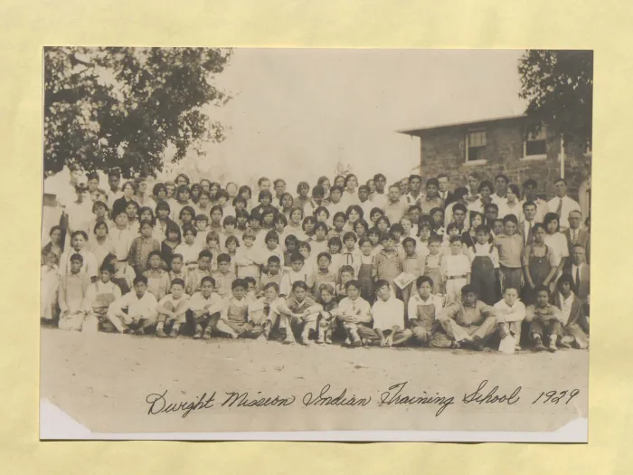 A photograph of students and staff of the Dwight Indian Training School. Dated 1929.