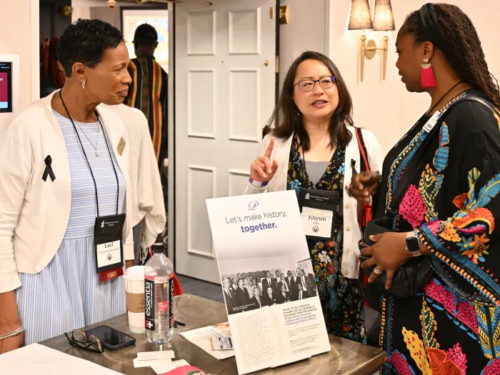 Luci Duckson-Bramble, Rev. Jihyun Oh, and Rev. Neema Cyrus Franklin, at PHS table at NBPC, Charlotte NC