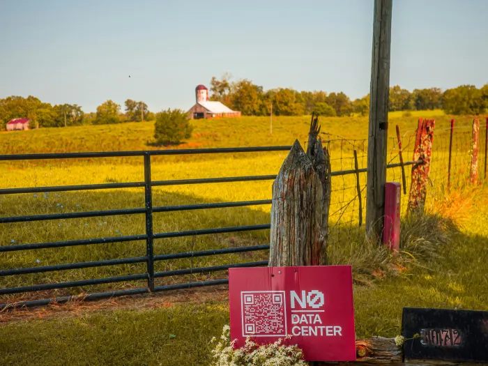 No data centers sign by a large field
