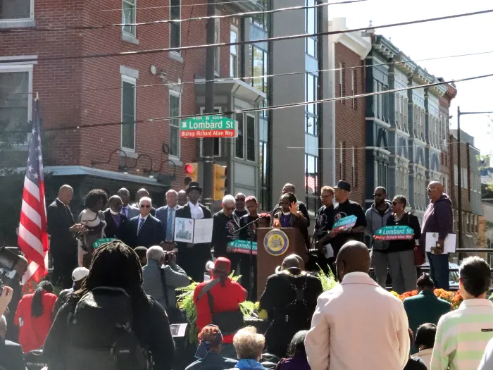 Bishop Cynthia Moore-Koikoi gives the closing prayer and benediction over the crowd.