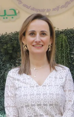 Smiling woman wearing pretty jewelry 