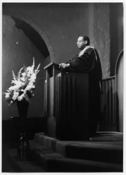 Moderator Rev. Dr. James Costen behind a podium at Santa Paula Presbyterian Church in Santa Paula, California, February 1983.
